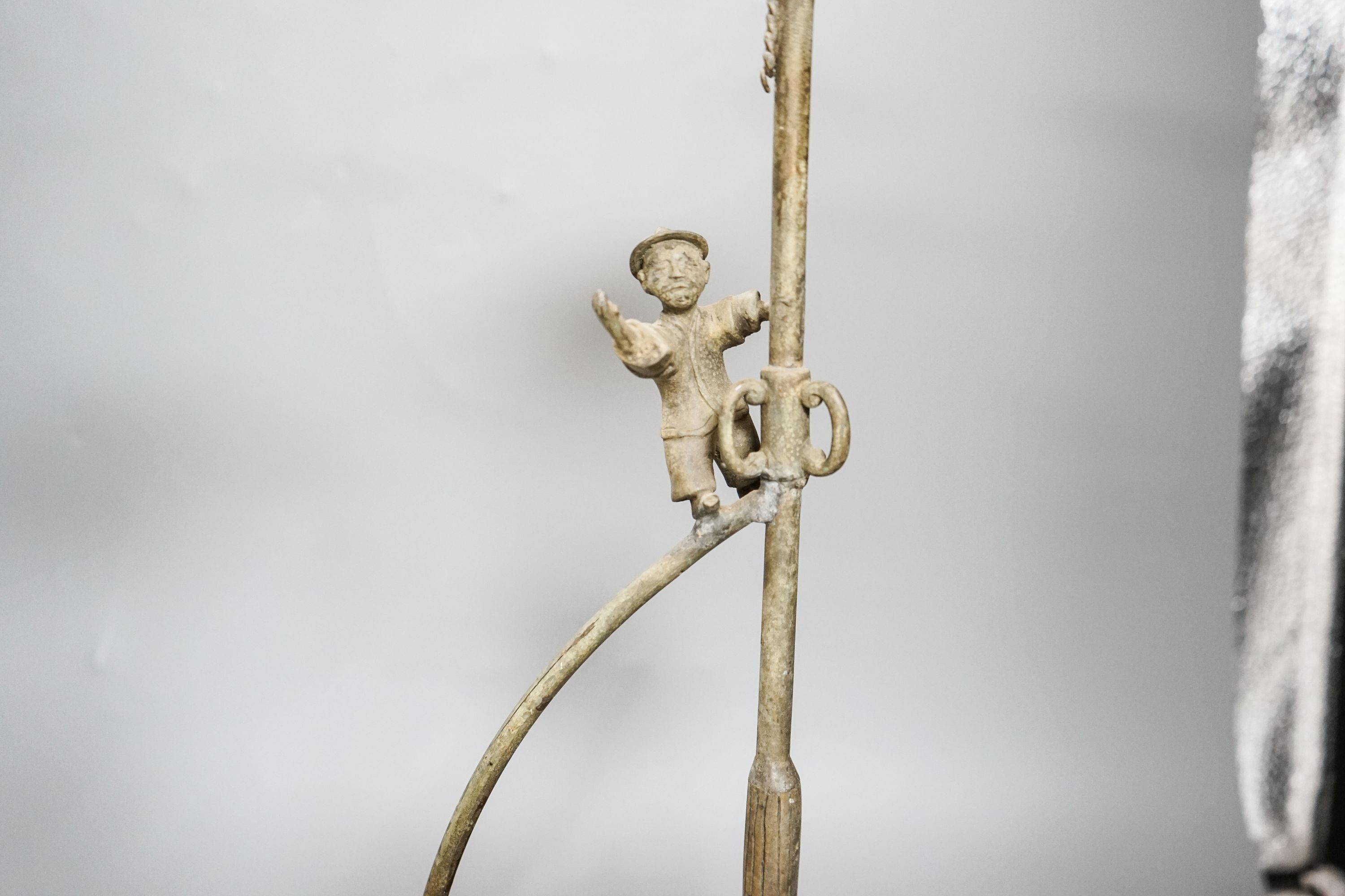 A pair of Chinese brass ‘ship’ lamp stands, 41cm